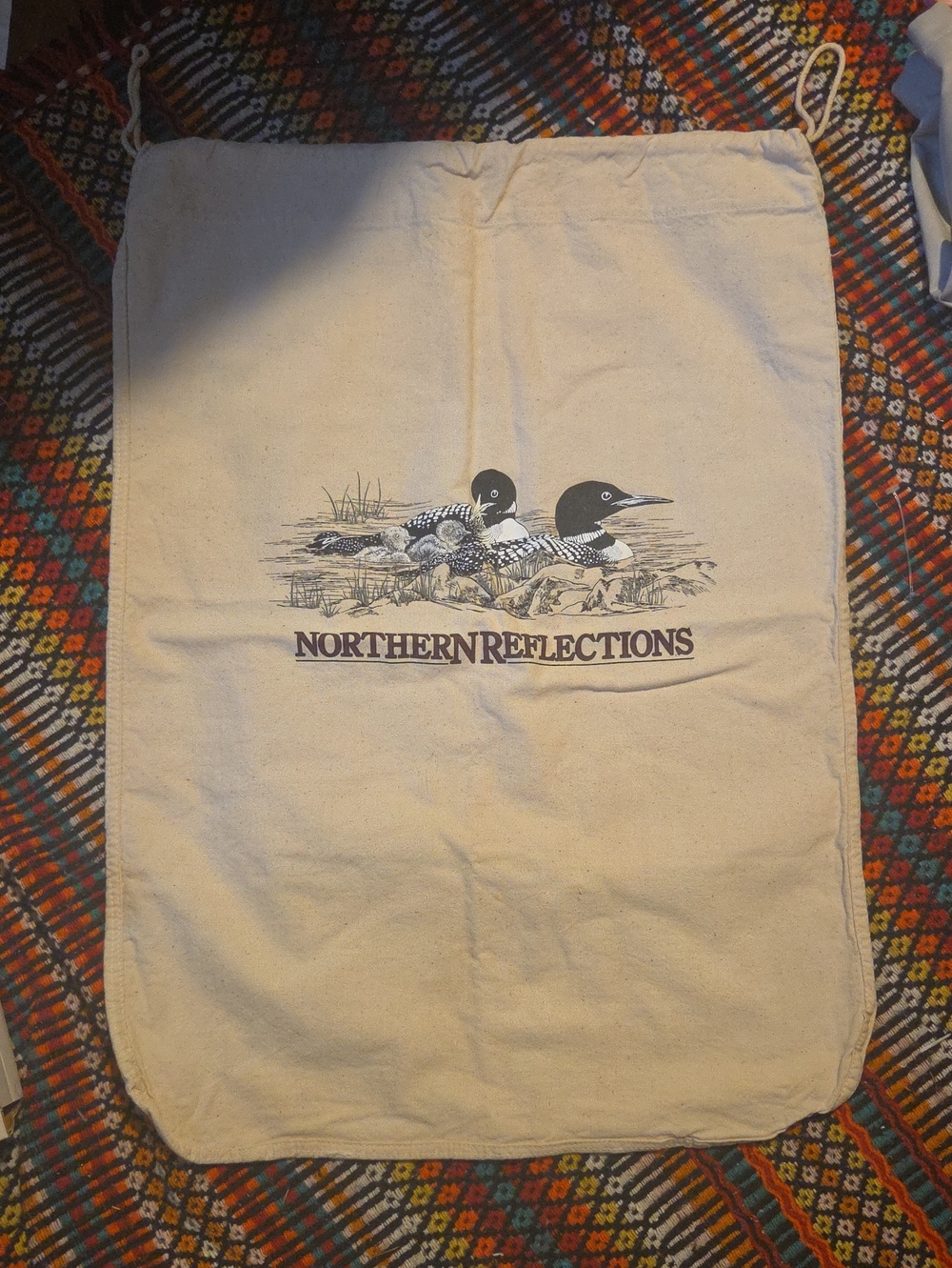 Northern Reflections Cream Canvas Drawstring Bag with Black Print